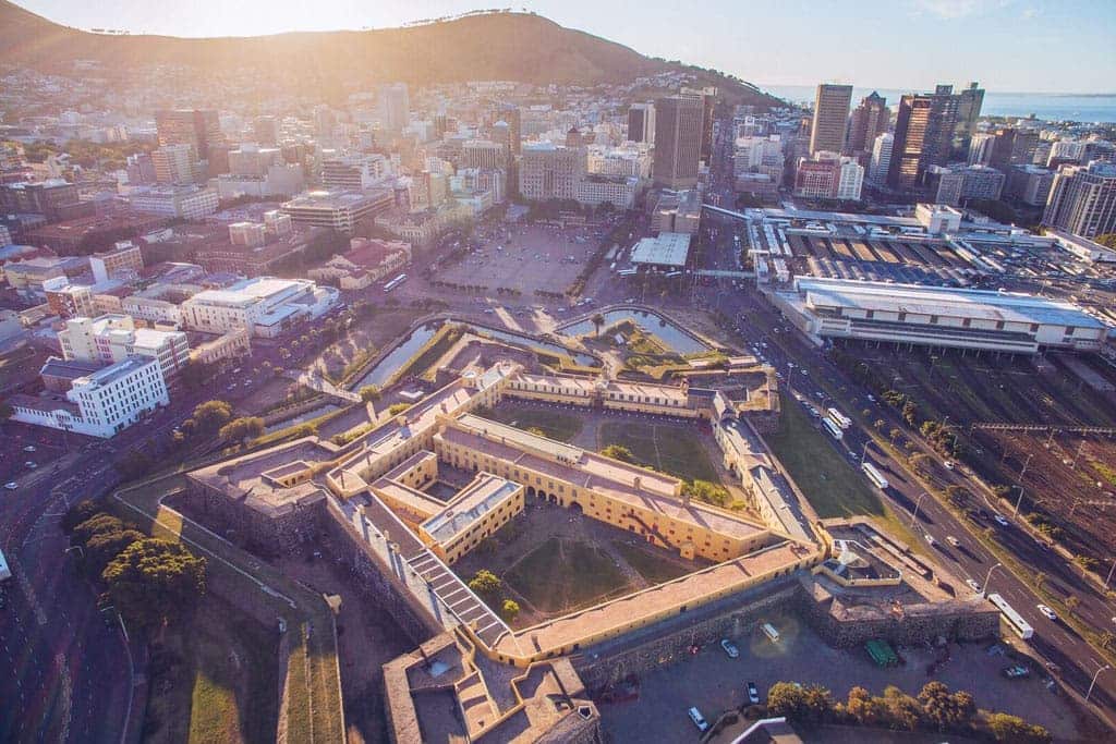Aerial view of the Castle surrounded by modern Cape Town